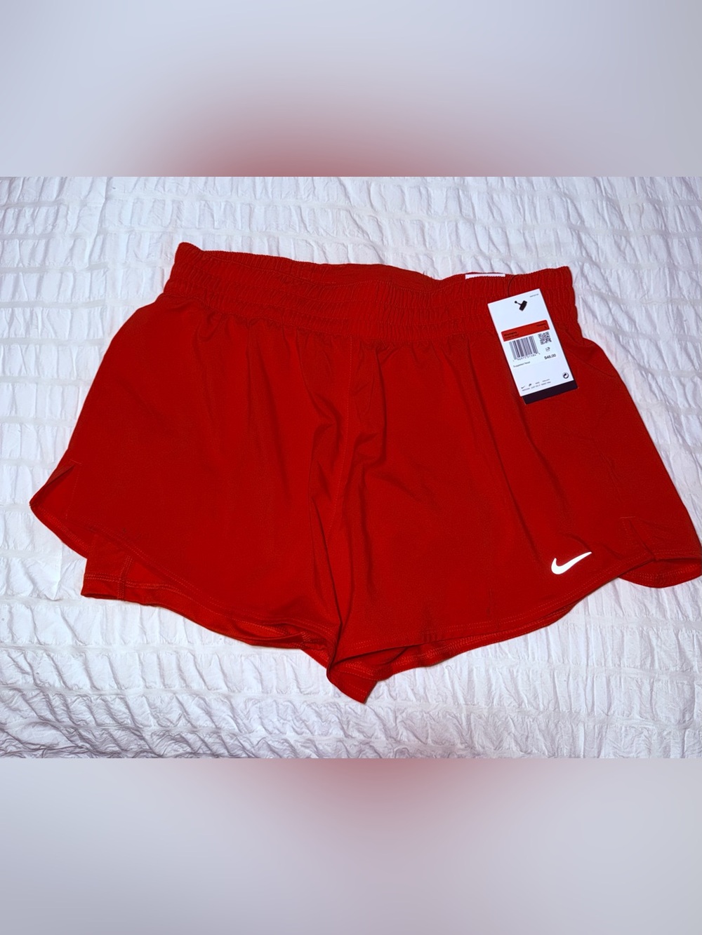 Nike Women’s Red Athletic Shorts with White Swoosh